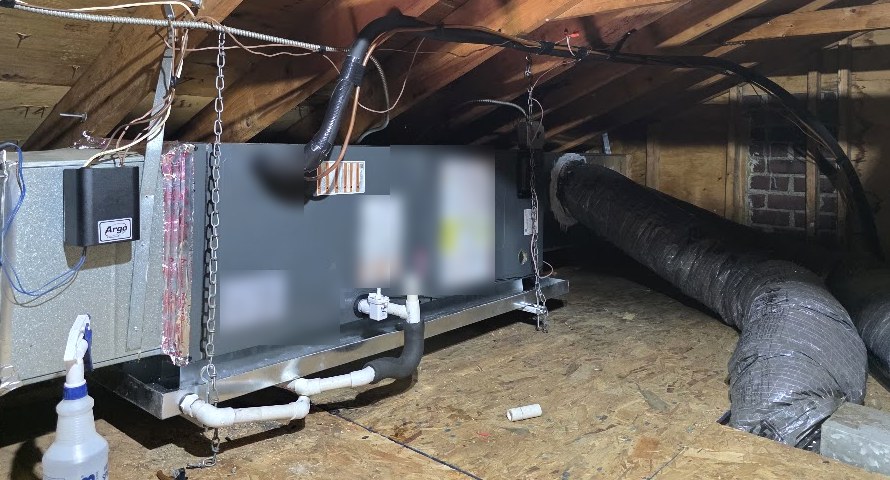 Horizontal air handler installed in an attic and connected to existing ductwork