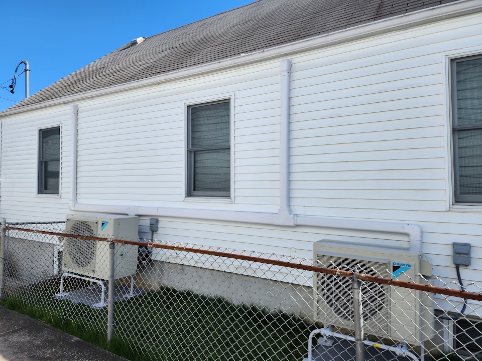 Two Daikin multizone ductless outdoor units with neatly covered exterior lines